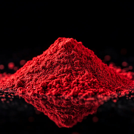 Image of Astaxanthin red powder on black background