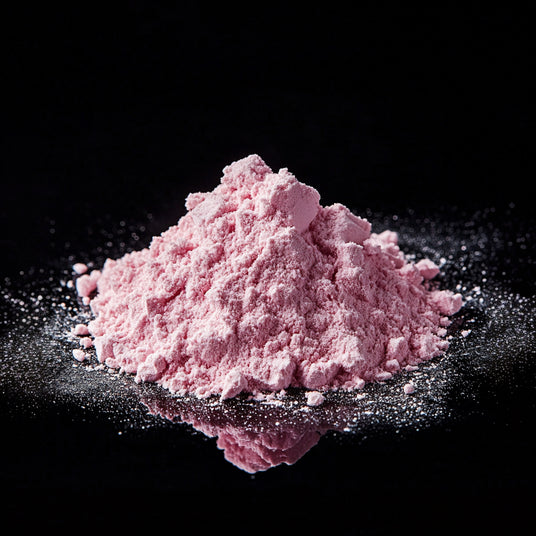 image of b12 pink powder on black background